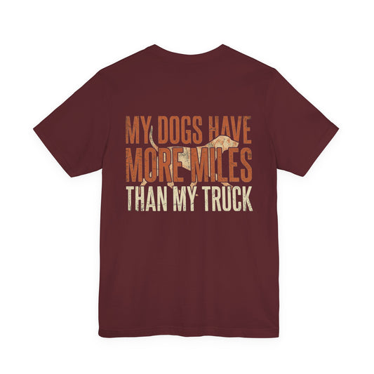 T-Shirt — "My Dogs Have More Miles Than My Truck" Dog Hunting Graphic Tee